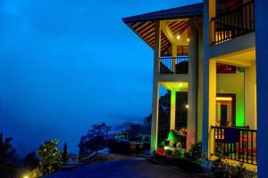 a view of a house at night at Grand Hills kandy in Kandy +140 photos