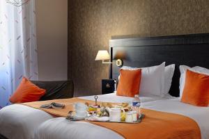 Postel nebo postele na pokoji v ubytování Best Western Plus Nice Cosy Hotel