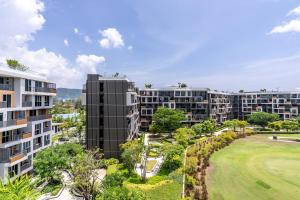 an aerial view of apartment buildings in a city at Skypark by Villacarte in Laguna Phuket