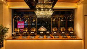 a display of wine glasses in a store window at Shyama Inn by Rivlet, Delhi in New Delhi