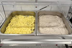 two trays of food in a plastic container at Baymont by Wyndham Findlay in Findlay
