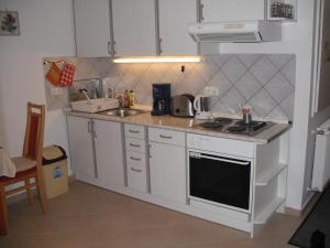 Kuhinja oz. manjša kuhinja v nastanitvi Aba és Andrea Apartmanok