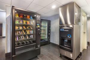 a food vending machine in a store with drinks at Quality Hotel in Burlington