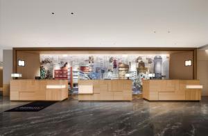 a store with a display case in a room at Canton Hotel Guangzhou, Tapestry Collection By Hilton in Guangzhou