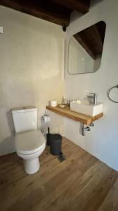 a bathroom with a toilet and a sink at Avalon Boutique Hotel Rhodes in Rhodes Town