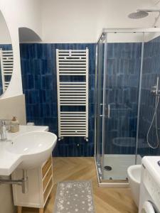 a bathroom with a sink and a shower at 5 Terre in Lerici +20 photos