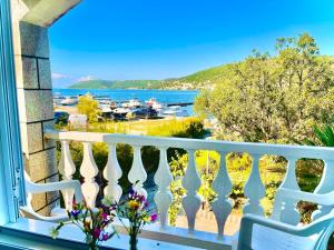 a balcony with a view of the water at Villa Csery 1stzime in Supetarska Draga