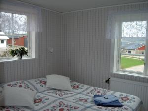 Postel nebo postele na pokoji v ubytování Stakaberg Konferens & Gårdshotell