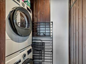 a washer and dryer on the side of a building at 3 Bed in Isle Of Arran oc-93240 in Pirnmill