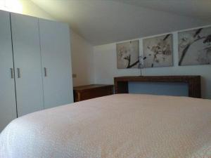 A bed or beds in a room at Un Nido Sul Mare