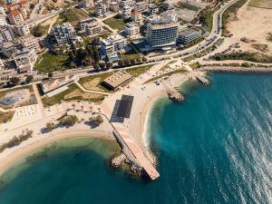 an aerial view of a beach and the ocean at Eol Apartments Split Žnjan Beach in Split