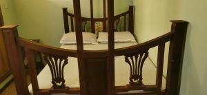 a small table with a mirror in a room at Arizona apartment in Zanzibar City +4 photos