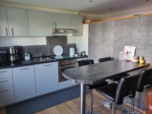 Cuina o zona de cuina de Privatunterkunft Straubing 19 fotos més