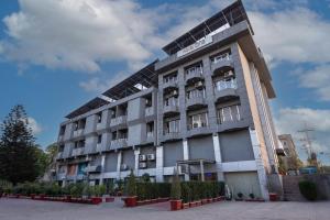 a building with a lot of solar panels on it at Hotel One Jinnah, Islamabad in Islamabad