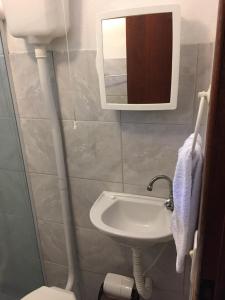 A bathroom at Flat em Búzios com ar