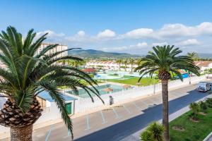 arial view of a resort with palm trees at Azul Turquesa in Peniscola