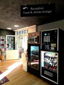 a restaurant food and drinks lounge with a food and drinks lounge at Sud Hôtel Restaurant in Bastia