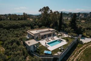 an aerial view of a house with a swimming pool at Melissia Luxury Villa in Zakynthos