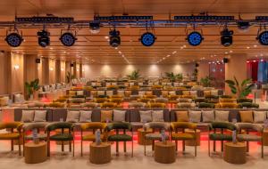 a large room with chairs and tables in it at AQUA Hotel Onabrava & Spa 4*Sup in Santa Susanna +232 photos