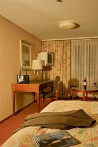 Postel nebo postele na pokoji v ubytování Hotel Krone + 16 fotografií