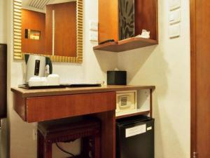 Cuina o zona de cuina de Oriental Lander Hotel