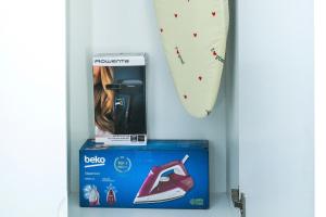 a door with a box next to a snowboard at Studio Mare Kotor in Dobrota