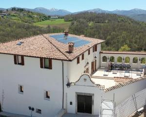 an image of a house with a swimming pool at Claustrum di Colforcella in Cascia