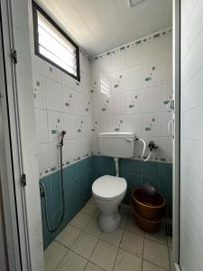 a bathroom with a toilet and a shower at De Lemo 3BHK Villa Homestay in Pondicherry +90 photos