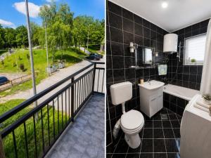 a bathroom with a toilet and a balcony at Apartman MATEJ in Vranješ