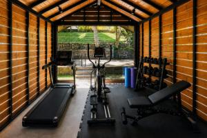 a gym with a bike in a building at Mirage Kandyan Heights in Kandy