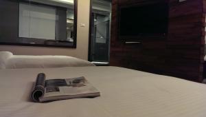 Postel nebo postele na pokoji v ubytování Sun Sweet Hotel