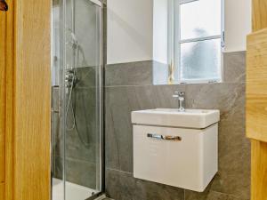 a bathroom with a shower and a toilet and a sink at 2 Bed in Taunton oc-80694 in North Curry +12 photos
