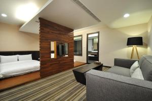 Postel nebo postele na pokoji v ubytování Sun Sweet Hotel