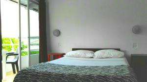 Postel nebo postele na pokoji v ubytování Bahia B&B