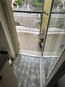 an open door to a room with a balcony at Casa Alessia Sanremo in Sanremo +7 photos
