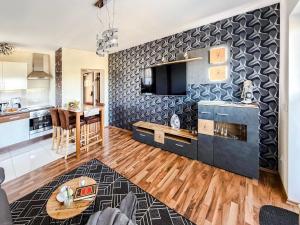 a living room with a kitchen and a dining room at Blissberg Winterberg in Winterberg
