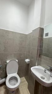 a bathroom with a toilet and a sink at Exclusive Modern Garden Flat ,Marrakech in Marrakesh +18 photos