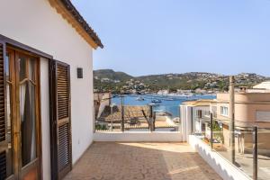 a balcony with a view of the water at Ca Ne Margalide - Andratx in Port d'Andratx