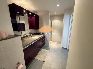 a bathroom with a sink and a shower at Le Clos Brémontier in Soorts-Hossegor +63 photos