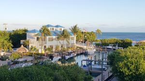 an aerial view of a resort with a marina at 2306 Ocean Pointe Suites in Tavernier