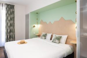 Krevet ili kreveti u jedinici u okviru objekta Hotel Florence Nice +71 fotografija