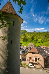 a view of a town from a tower at Le Passage - Gîte 2 à 15 personnes Chartreuse terrasse, calme & nature in Saint-Pierre-dʼEntremont
