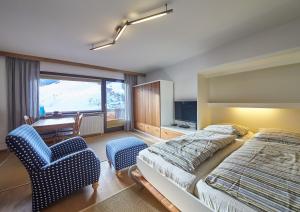 Ein Bett oder Betten in einem Zimmer der Unterkunft SunnySide Appartements