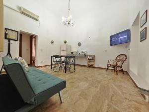 a living room with a couch and a table at Zio Achille in Gallipoli