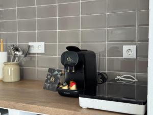 a coffee maker sitting on top of a kitchen counter at LaJoya Zuheros Suite in Zuheros
