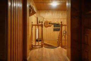 an inside view of a sauna with a treadmill at Guest House Mandrivnyi Rooms&Apartments in Yasinya