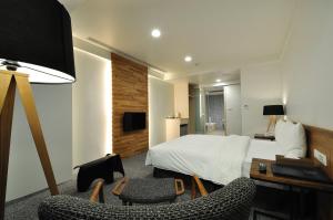 TV a/nebo společenská místnost v ubytování Sun Sweet Hotel