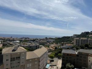 an aerial view of a city with buildings at Studio climatisé avec vue mer in Bastia +6 photos