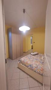 a bedroom with a bed in a room at Il Caruggio in Cabella Ligure