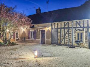 a house with a candle in front of it at Chez nenette in Prugny